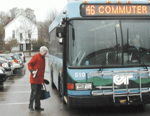 A commuter boards the 116 Commuter bus in Hinesburg, Vermont.